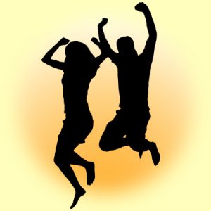 silhouettes of a male and female adult leaping for joy because they are happy and feel well because they meditate